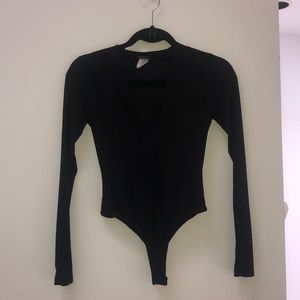 Akira 🖤 deep V black bodysuit
